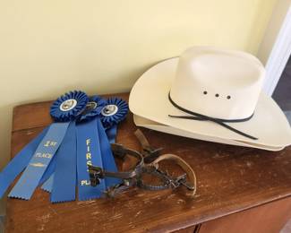 Cowboy hats, horseback ribbons