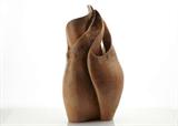 An excellent, sinuous modern art pottery sculpture by well known Lexington, Kentucky ceramicist Wyman Rice. An untitled work, in a scorched earthy glaze. The piece, an delightful abstract, with folds and rolling lines, a few peaks here and there. Marked on the base with a tag.