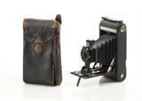 A vintage Eastman Kodak 1-A Autographic Junior camera, with leather covering and original leather carrying case. A nice vintage decorative piece.