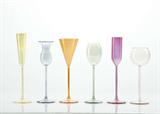 A set of six extraordinarily delicate modern art glass cordial glasses, each of a different form and color. Made in Italy for Vietri, the set is evocative of the designs of the Memphis group, albeit a bit more subtle and soft. Range in color from nearly colorless to a rose-crimson.