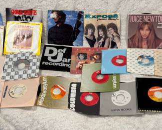 (20) 45s Vinyl Lot - Feat : Blondie & Dire Straights
Albums include but not limited to - Dire Straights, Samantha Fox, Georgia Satellites, Blondie, George Harrison, Ecpose, Juice Newton, Bangles, Billy Joel, Joey Scarbury, Elton John, Scandal, Joe Dolce, Don Williams, etc. Not all album sleeves were checked if record matches skin or condition of vinyl. 
