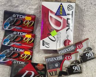 Maxwell And TDK Blank Cassette Tapes
Sleeve of 10 TDK 90 minute cassette tapes with three additional TDK 90 minute tapes and one TDK 60 minute tape. Two Maxwell 90 minute cassettes. 