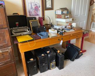 desk, electronics, boxes of cancelled stamps