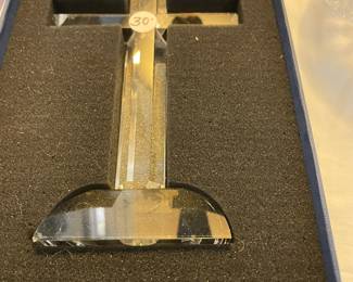 many crystal crosses & angels & candlesticks
