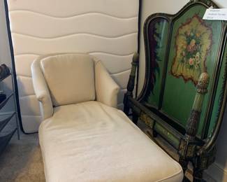 Beige Chaise lounge and behind a never used Mattress