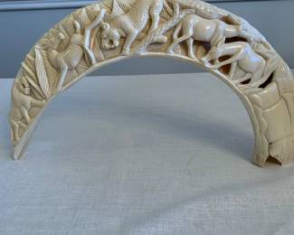 Beautifully carved wart hog tusk.  Very large