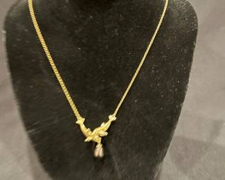 14 Karat Gold dolphin necklace