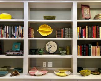 The yellow leaf/ashtray on the center shelf is sold.