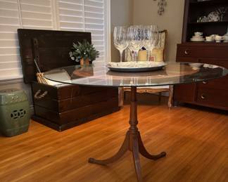 The wine glasses,  pewter tray on the table and green garden stool are sold. 