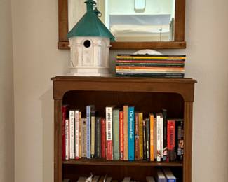 The mirror and bookcase are sold.