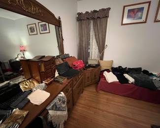 A lady’s haven: scarves, evening bags, purses, clothes, shoes, and hats. Most of the clothes and shoes are new still with tags on. Shoes are 91/2-11, clothes med to large, depending on style. My mom knew how to shop!