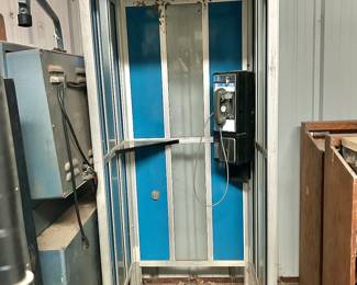 Phone booth and payphone.