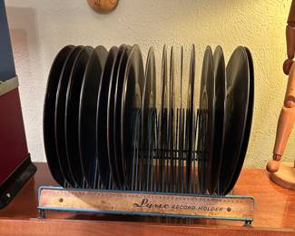 Vinyl holder with Victrola records.