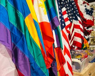 A flag from around the world!  We have nylon, cotton, old and new.  We even have a GIGANTIC AMERICAN FLAG CAR DEALERSHIP SIZE!  We also have vintage flag poles and they are super cool.