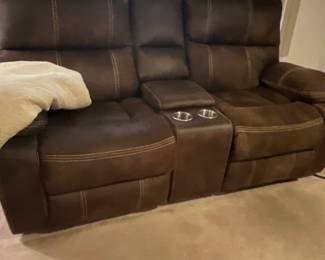 Brown leather reclining sofa