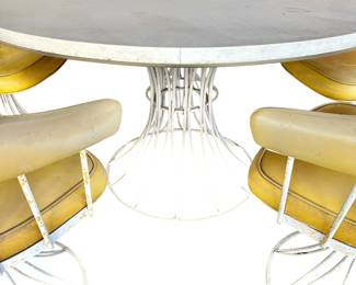 Outdoor 70's round table with 5 barrel chairs --upholstery needs work
