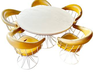 Outdoor 70's round table with 5 barrel chairs --upholstery needs work