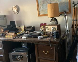 Various electronics...some vintage radios, cameras and lens, tripods, safe, Alex Stuart Executive Desk