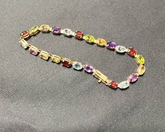 Gold and gem bracelet