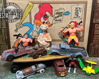Vintage action figures
Vintage metal toy cars and trucks
Vintage WWF wrestling figurines
E.T.
Woody woodpecker