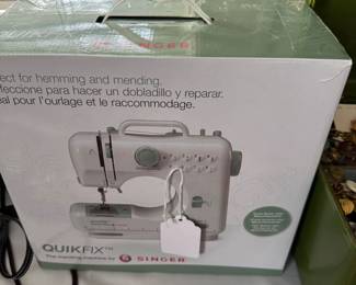 New in box portable sewing machine