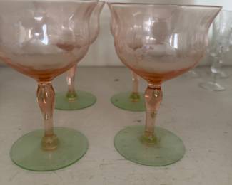 Interesting pink depression glass goblets with green bases