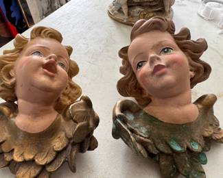 Antique putti heads