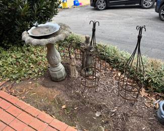 Garden bird bath, St. Francis, and topiary forms
