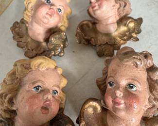 Antique putti small heads