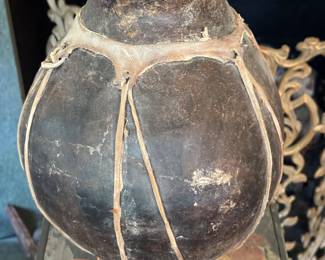 Asian pottery vase on stand