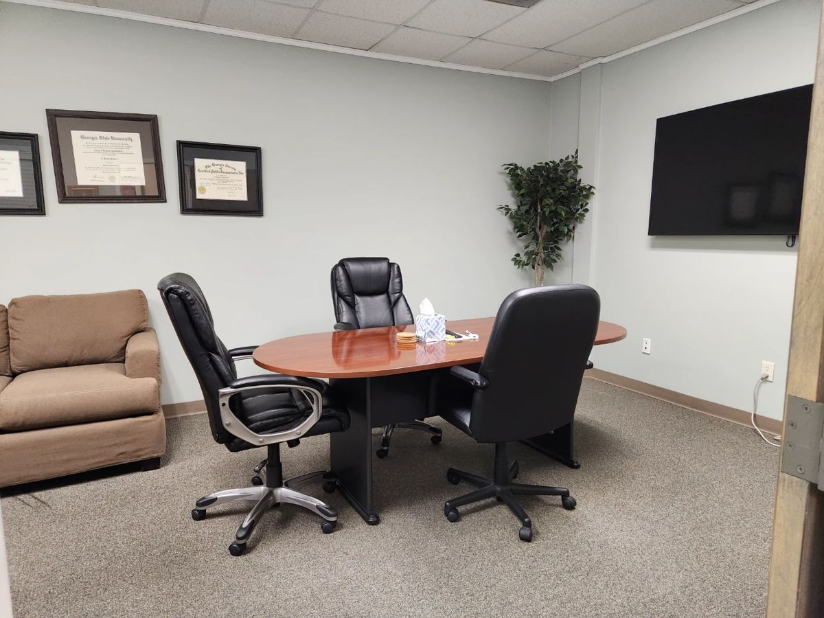 Conference table and executive chairs. 