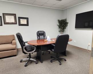 Conference table and executive chairs.