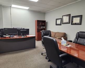 Conference table, chairs, desk, bookcase