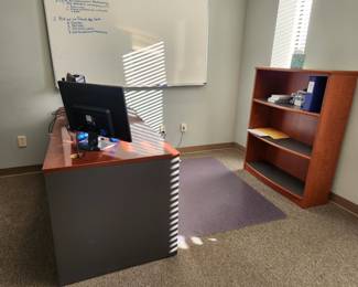 Desk and bookshelf.