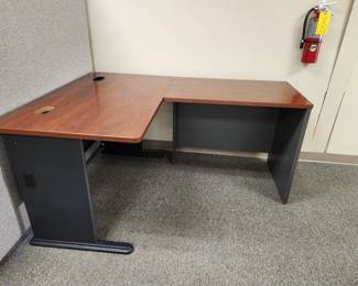 L-shaped desk (this is the smaller of the L-shaped desks) and was used as a reception desk.