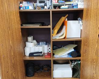 Office supplies, electronic calculator, tape rolls, hanging files, pens, sticky note pads, staplers, pen holders, envelopes, organizers, monitor stands, trash cans, foot rests