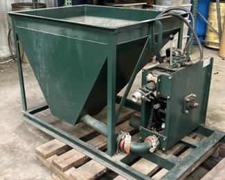 Targhee Pump Model 110 Shotcrete Pump. Used for
swimming pool and monolithic dome construction.
