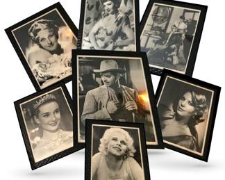 Reproduction signed photos of 20th Century movie icons, all in identical frames; shown clockwise from top left, with Clark Gable in the center:  Norma Shearer, Claudette Colbert, Ingrid Bergman, Natalie Wood, Jean Harlow, Audrey Hepburn; Carole Lombard not shown but included

