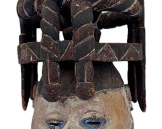 Likely Yoruba headdress; we’re guessing postcolonial 