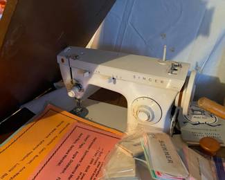 Sewing machine and cabinet