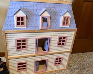 Beautiful wooden dollhouse and furniture