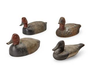 1439
Early 20th century
Four carved wood duck decoys
The painted wood duck figures, comprising two redheaded drakes and two others, 4 pieces
Tallest: 8" H x 15" W x 6.625" D; Smallest: 6.625" H x 13.75" W x 5.75" D
Estimate: $300 - $500