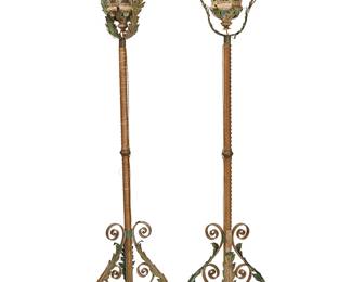 1474
20th century
A pair of Venetian-style tole lanterns
The three-light floor-standing lanterns, each adorned with applied tole foliate-form accents and raised on a fabric-wrapped standard and tripod base, electrified, 2 pieces
Each: 84.5" H x 18.5" Dia.
Estimate: $400 - $600