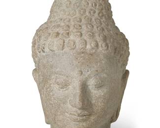 1407
20th century
A carved stone Buddha head
The head depicted with traditional ushnisha
10.5" H x 6.75" W x 7" D
Estimate: $200 - $300