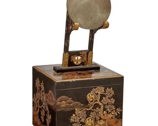 1396
Meiji Era 1868-1912
A Japanese ebonized vanity and bronze mirror
The black lacquered wood vanity with two drawers and a bronze mirror, decorated with gilt and painted trees, mountain landscapes, and foliate motifs
Box: 10.75" H x 11" W x 11" D; Overall: 25.5" H; Stand: 15" H x 8.25" W x 3.875" D
Estimate: $500 - $700