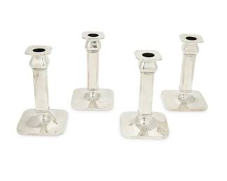 1326
Mid-20th century
A set of Tiffany & Co. sterling silver weighted candlesticks
Each marked: Made for Tiffany & Co. / Sterling / Cement Filled / 915S; each etched: 174624
Comprising four squared candlesticks, each with removable bobèche
Each: 6.125" H x 3.75" W x 3.75" D
Estimate: $400 - $600
