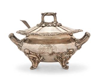 1334
19th century
An English Sheffield silver-plated tureen
Spoon marked for sterling and for London, with George III duty mark, date marked for 1800, and with maker's mark: SH [likely Solomon Hougham]; tureen appears unmarked
The lidded tureen with opposed handles, featuring foliate motif accents and raised on four feet, together with a sterling silver serving ladle, tureen personalized
Tureen: 6.25" H x 9.25" W x 5.75" D; Ladle: 6.875" L
Weighable sterling (ladle): 1.5 oz. sterling approximately
Estimate: $200 - $300