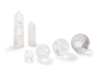 1423
20th century
A group of rock crystal specimens
The cut and polished specimens comprising four orbs and two obelisks, 6 pieces
Largest orb: 6.5" Dia.; Largest obelisk: 14" H x 4.25" W x 3.25" D
Estimate: $300 - $500