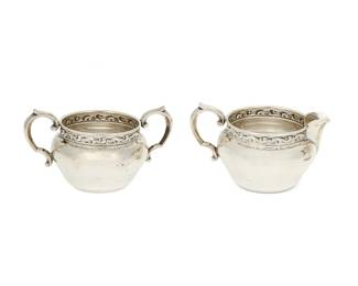 1333
Late 20th/early 21st century
A Reed & Barton "Tara" sterling silver cream jug and open sugar
Each marked: Reed & Barton / Sterling / X828
Comprising a creamer and an open sugar, each with foliate-form handle and banded repoussé floral pattern to rim, 2 pieces
Creamer: 3" H x 4.875" W x 3.5" D; Sugar: 3" H x 5.25" W x 3.5" D
5.6 oz. troy approximately
Estimate: $200 - $300