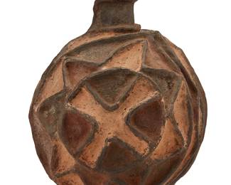 1429
20th century; Rwanda/Burundi
A Tutsi polychrome pottery vessel
The three-color terracotta vessel with flared neck, featuring opposed geometric and wandering designs in high relief
15.25" H x 11.25" Dia.
Estimate: $200 - $300